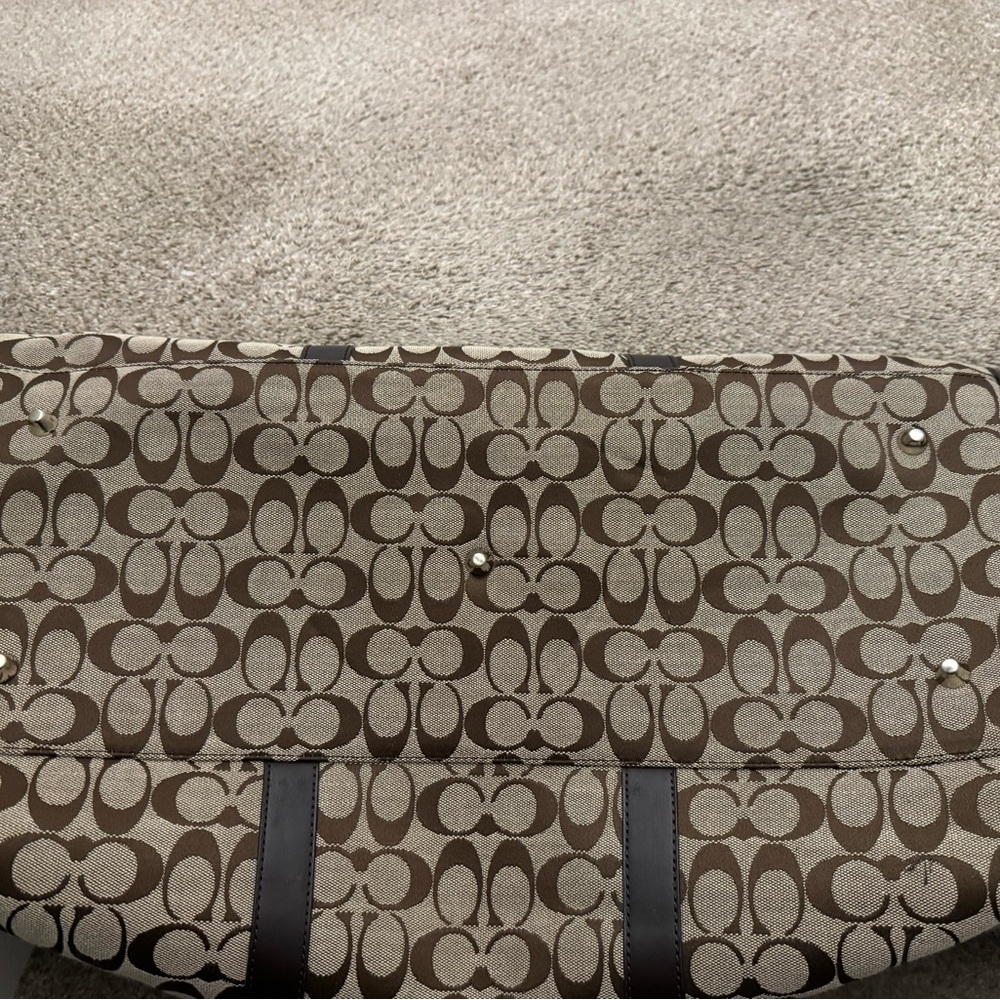 Coach duffle bag khaki/brown w/strap slight wear/tear. - Picture 10 of 14